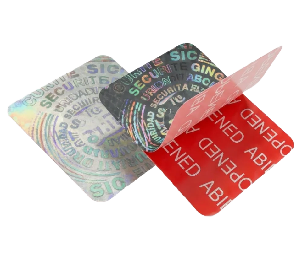 Etiquetas de seguridad holográficas: una intacta y la otra mostrando el mensaje VOID, Fabricante: Etimex Digital en Mexico.